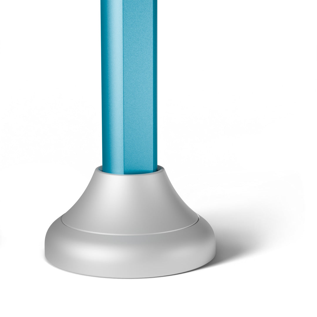 Closeup of a Nada Toothbrush Stand holding an Arctic Blue Nada Toothbrush