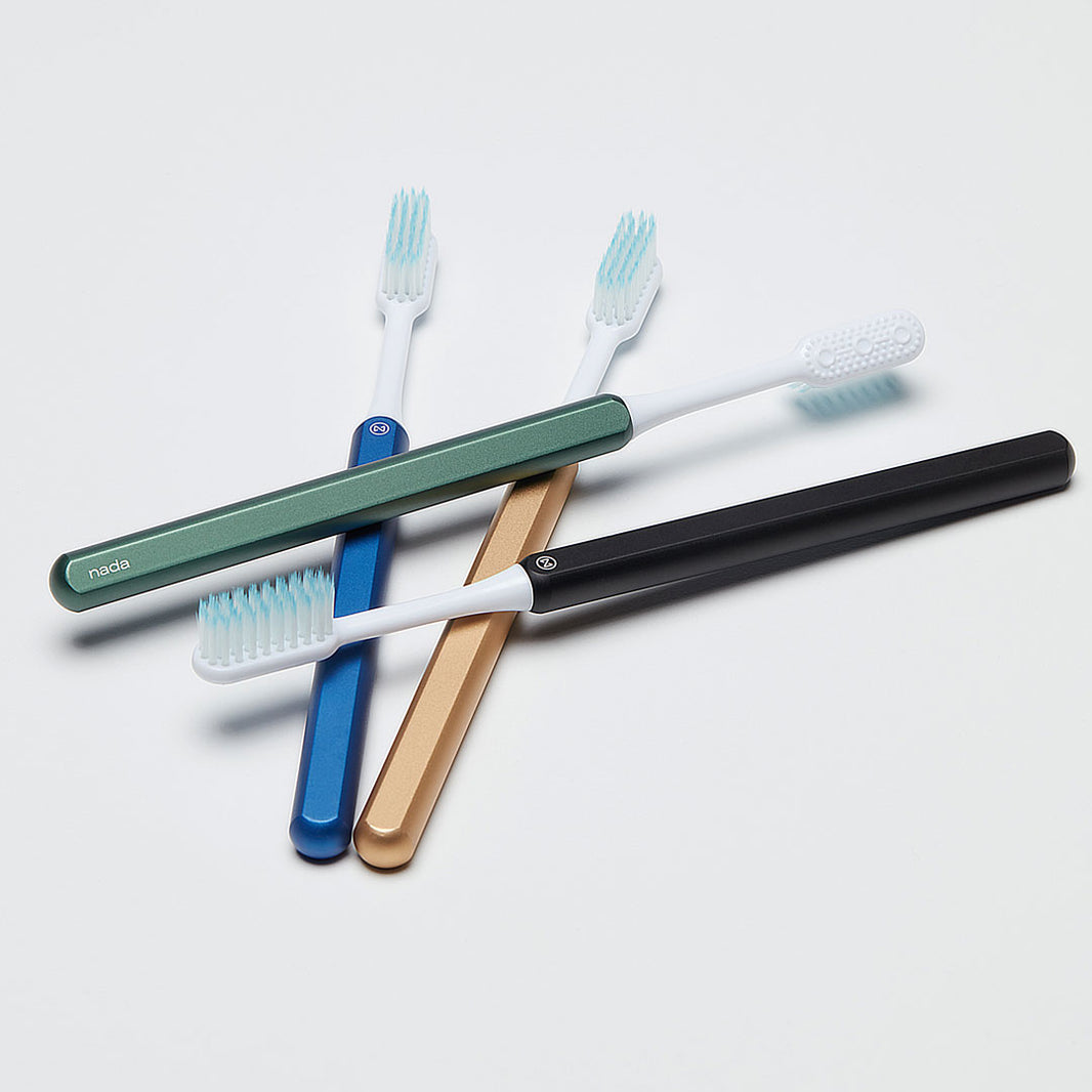 Green, Ocean Blue, Gold and Black eco-friendly Nada toothbrushes