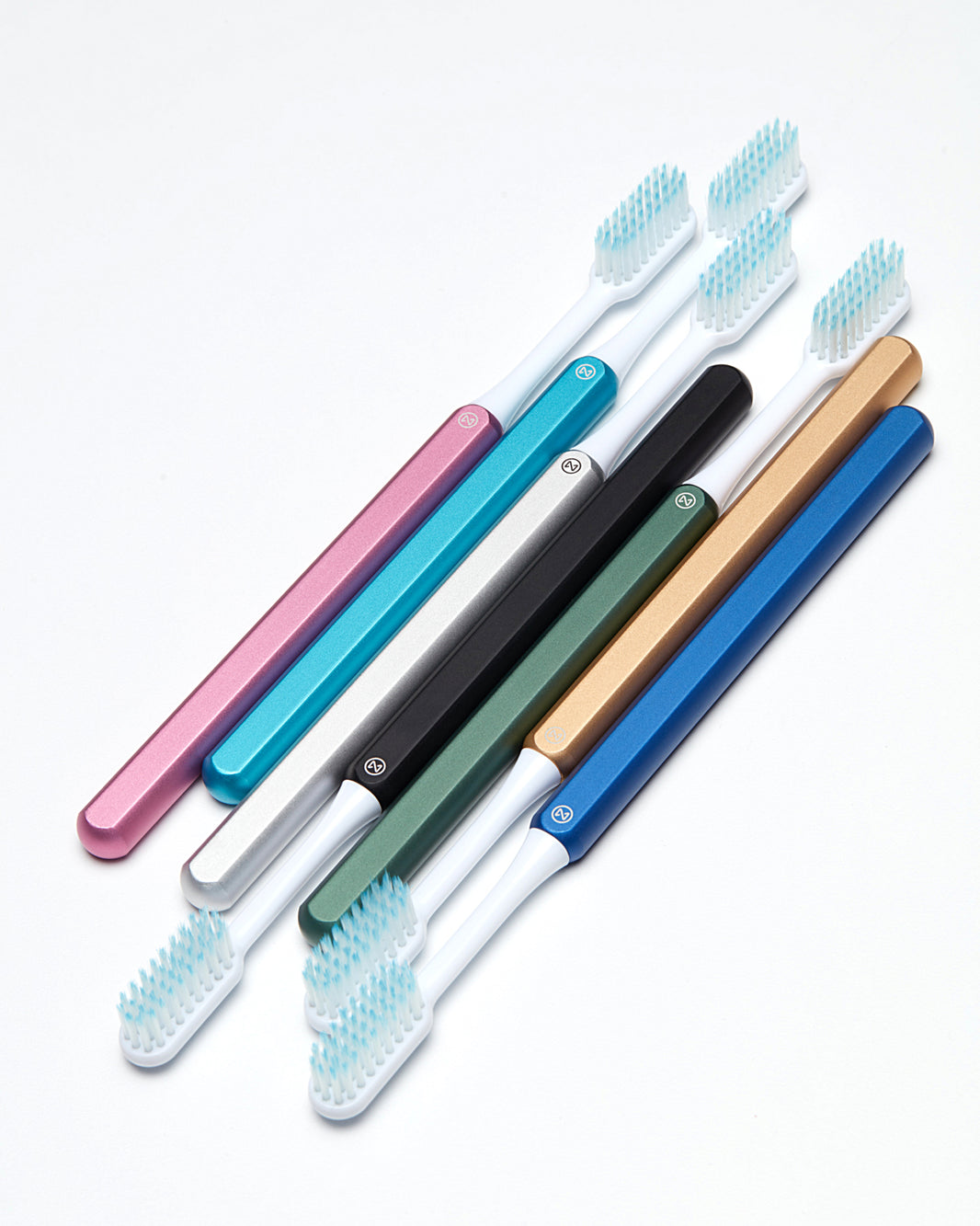 Sustainable Nada toothbrushes with aluminum handles and replacement toothbrush heads