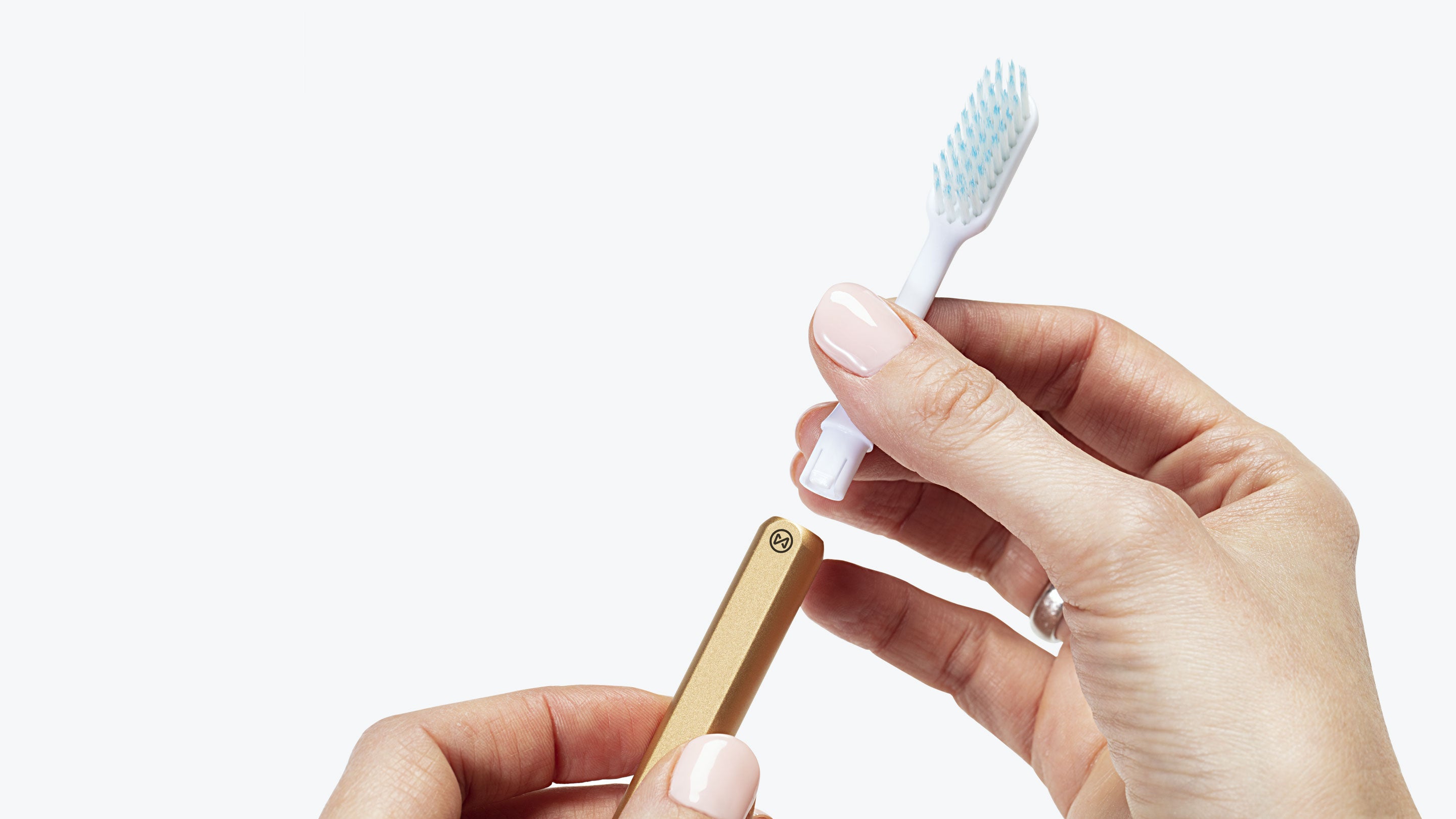 Nada sustainable toothbrush with an aluminum handle and recyclable brush heads