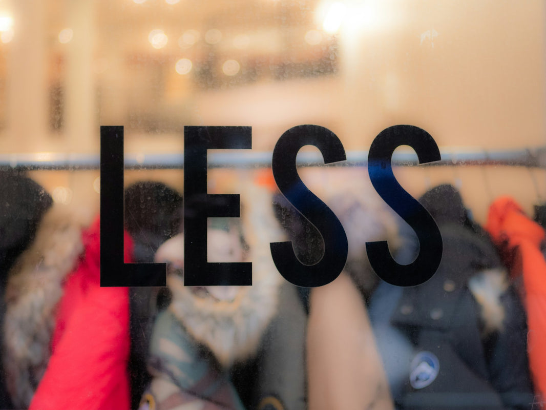 The word LESS on a clothing shop window