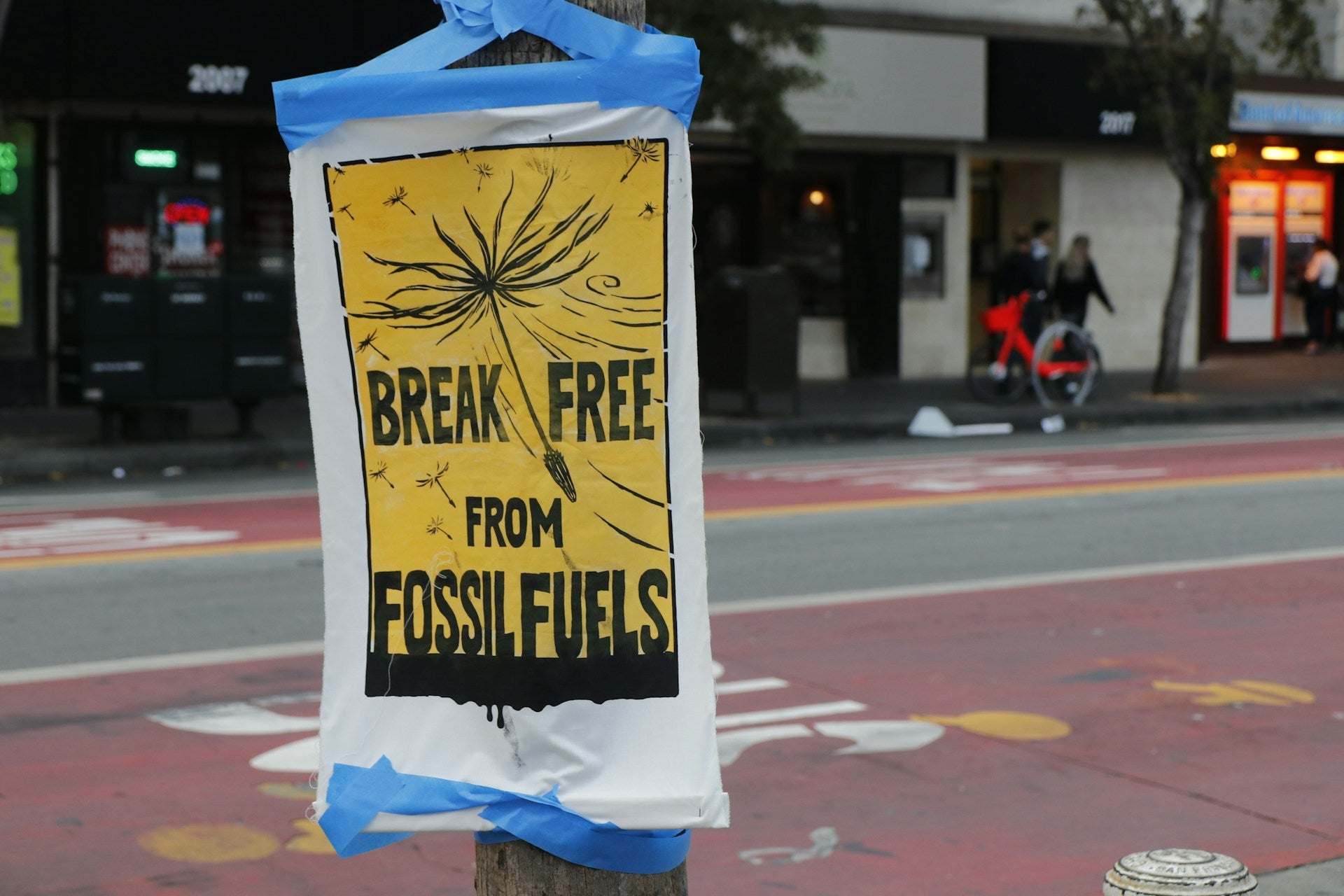 Poster reading "Break Free from Fossil Fules"