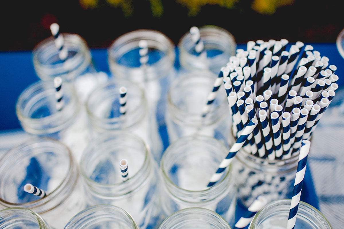 Photo of glass jars full of plastic straws