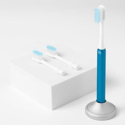 Nada Kids eco-friendly Blue toothbrush with a metal handle and recyclable toothbrush heads