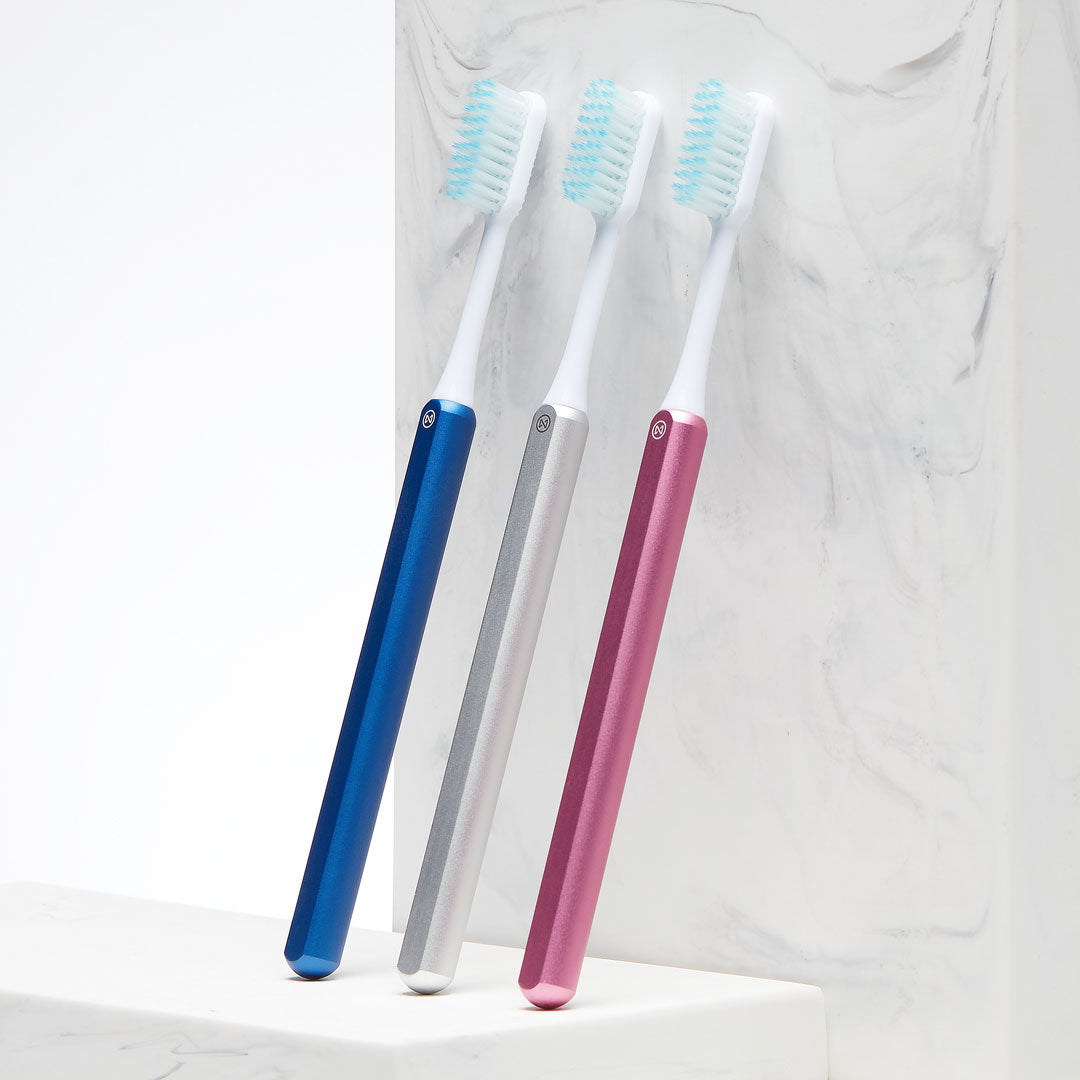 Ocean Blue Silver and Pink Nada Toothbrushes 