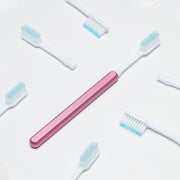 Pink Nada Toothbrush with recyclable toothbrush heads