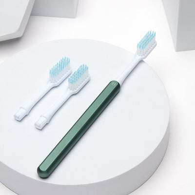 Green Nada Sustainable Toothbrush with a Metal Handle and Replacement Toothbrush Heads