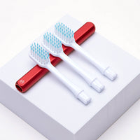 Red aluminum Nada Kids Toothbrush handle with 3 eco-friendly replacement brush heads