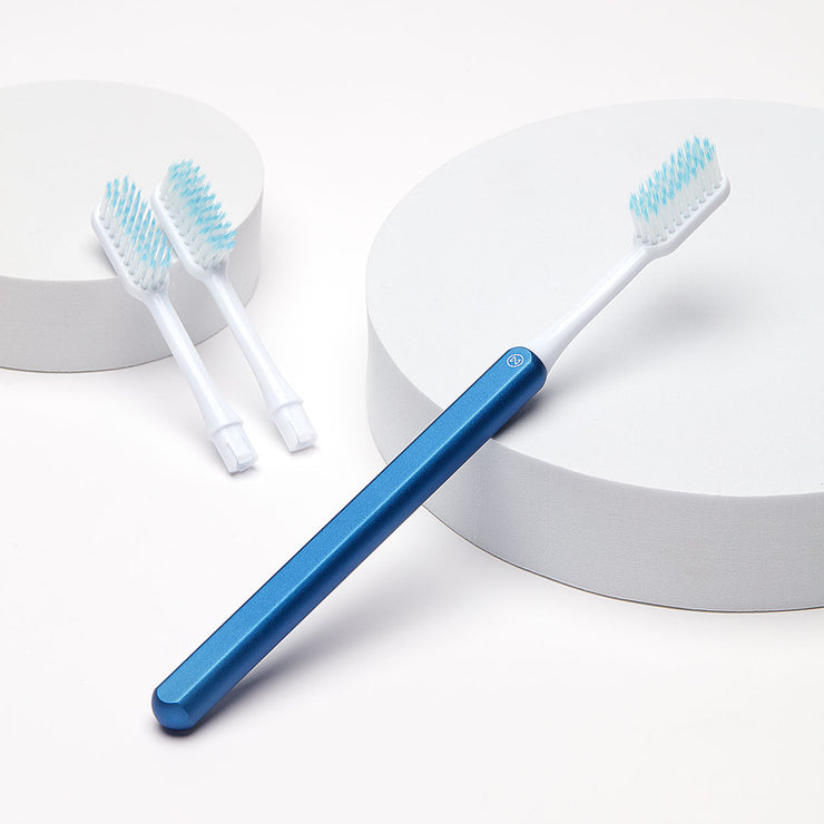 Ocean blue Nada Eco-friendly Toothbrush with a Metal Handle and Replacement Toothbrush Heads