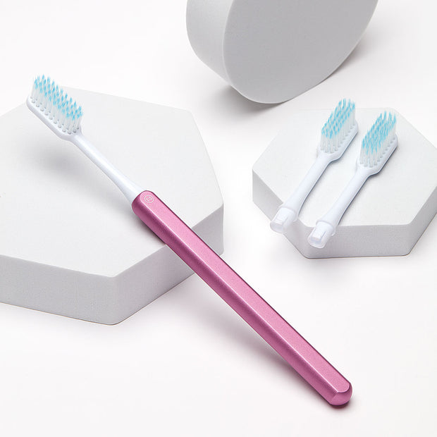 Pink Nada Eco-friendly Toothbrush with a Metal Handle and Replacement Toothbrush Heads